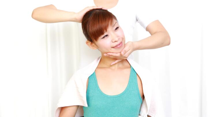 Woman getting chiropractic adjustment