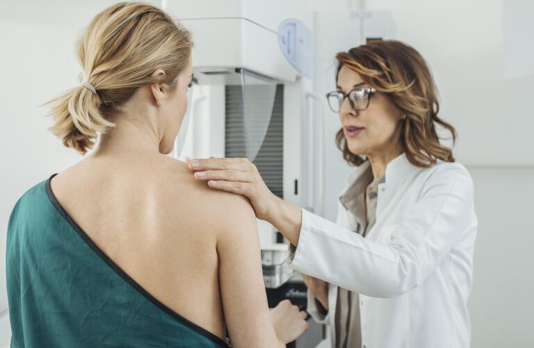 Woman prepped for mammogram