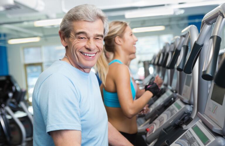 active-senior-man-exercising-on-treadmill