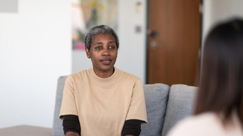 woman talking with therapist during counseling session