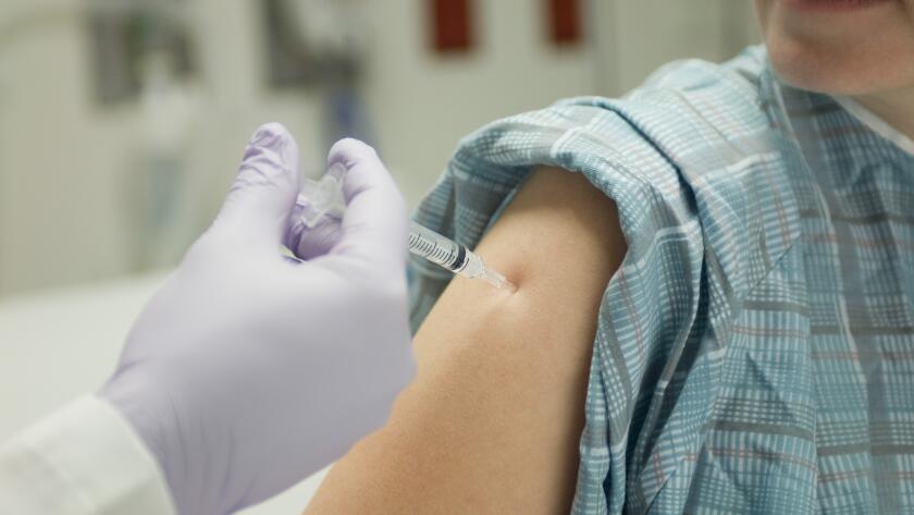 woman-receiving-shot-in-arm