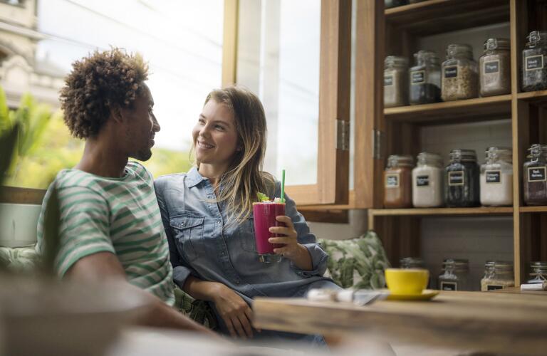 Young couple on date in coffee shop