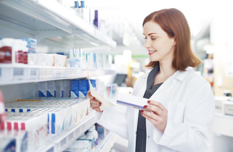 female-pharmacist-reading-prescription