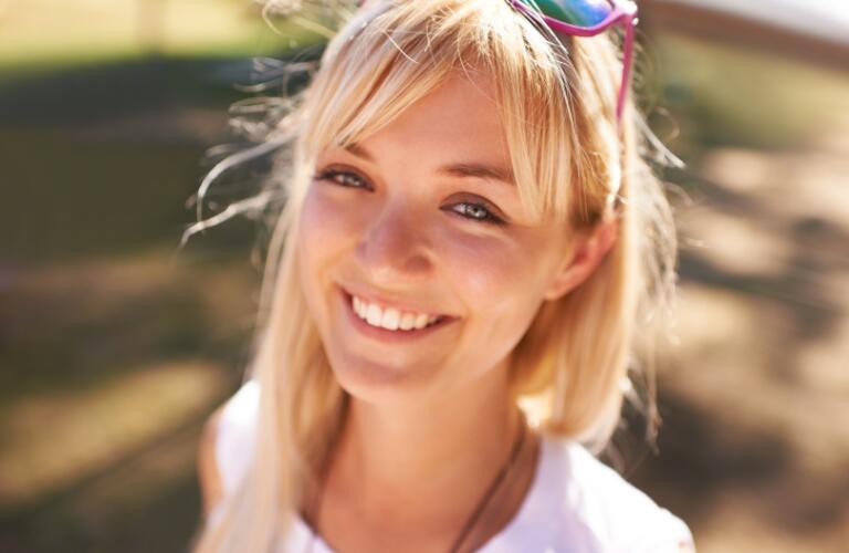 Girl smiling outdoors