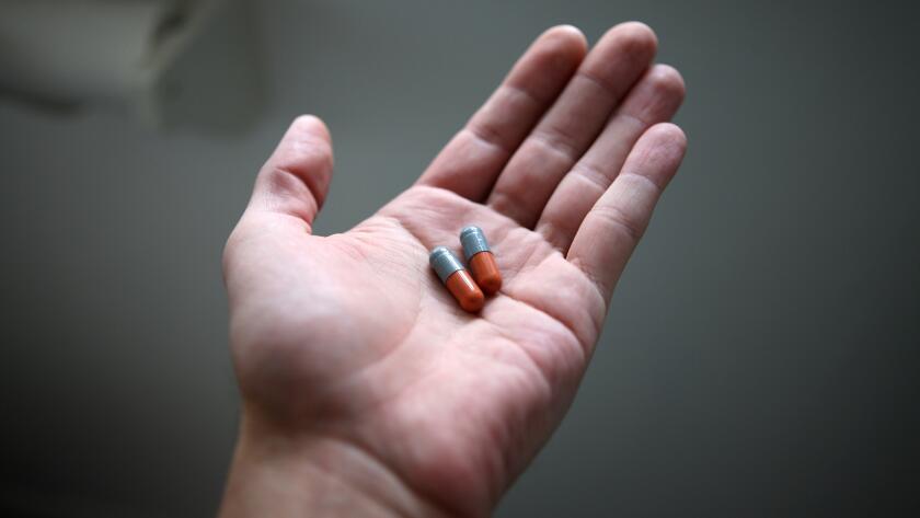 hand-holding-pills
