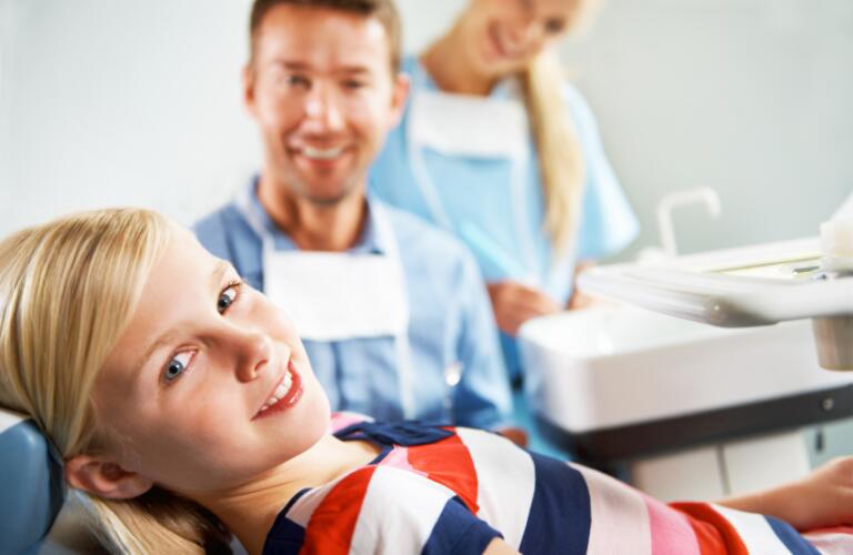 Young girl in dentist chair