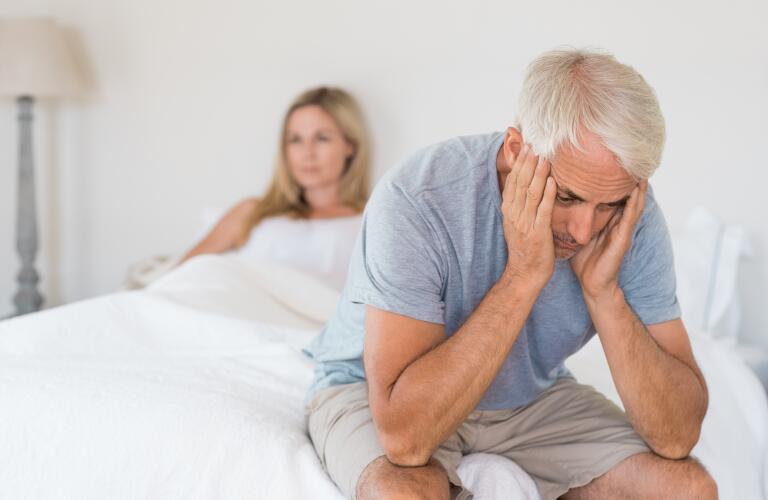 Older man in bed
