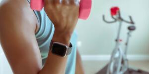 Woman Holding Lightweight Dumbbell