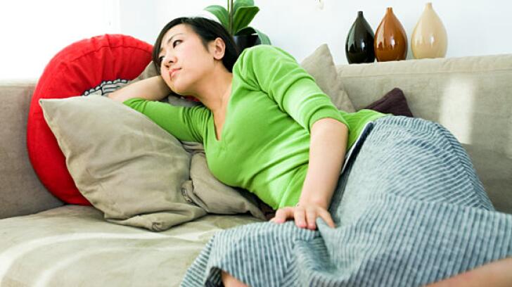 Medication Can Have Side Effects, laying down, couch, tired, lazy, sad