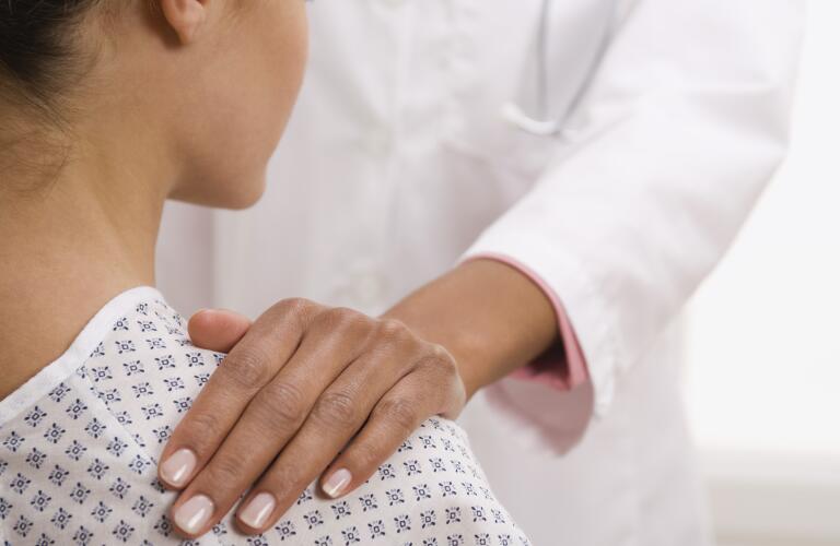 doctor-with-hand-on-patients-shoulder