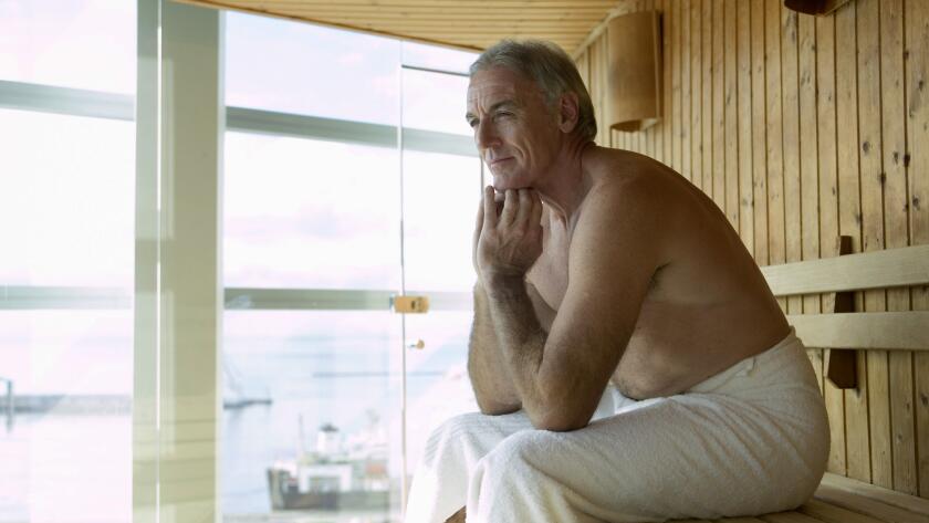 Man sitting in sauna