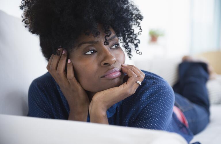 woman resting her head