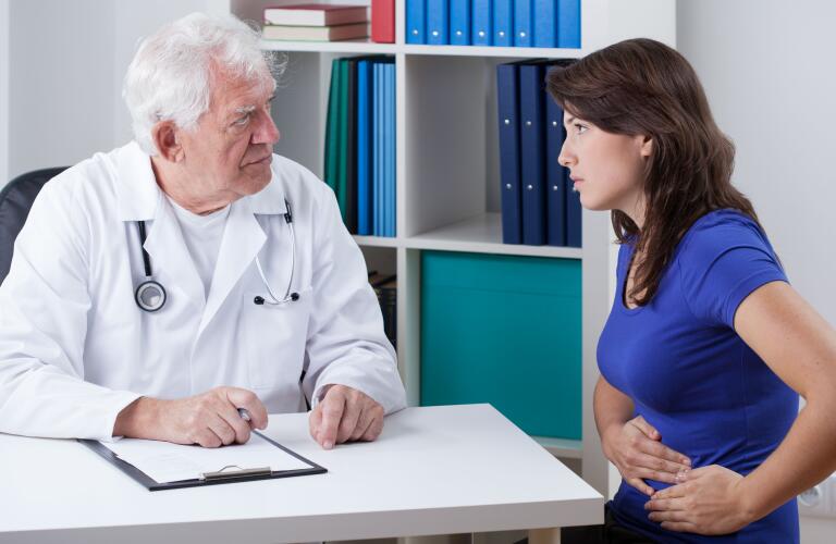 Woman with stomach pain