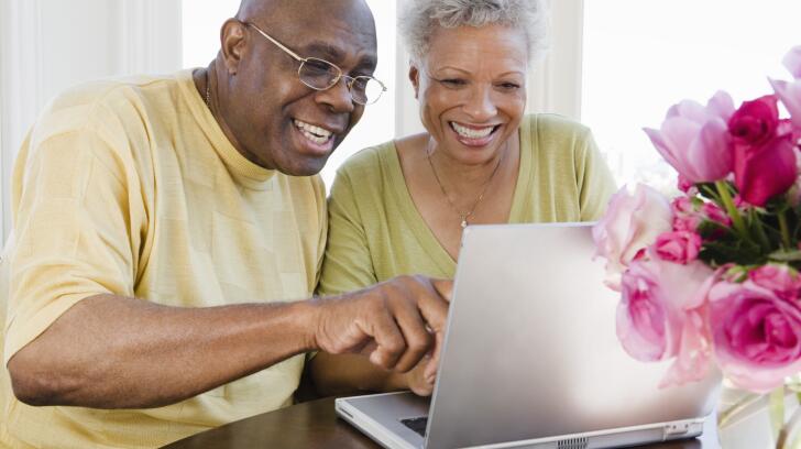 couple Using Laptop Computer