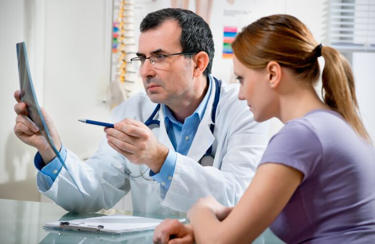 Doctor Discussing Patient Care