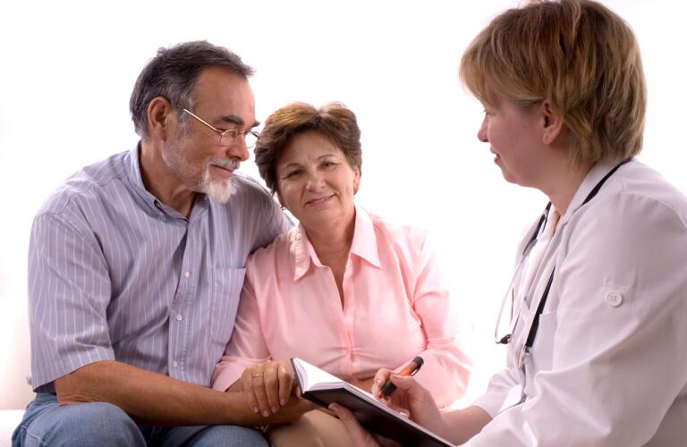 Couple visiting with doctor