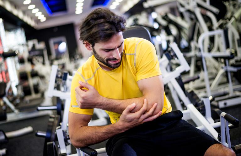 Man at gym injures elbow