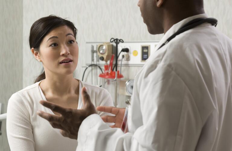 doctor explaining medical problem to patient