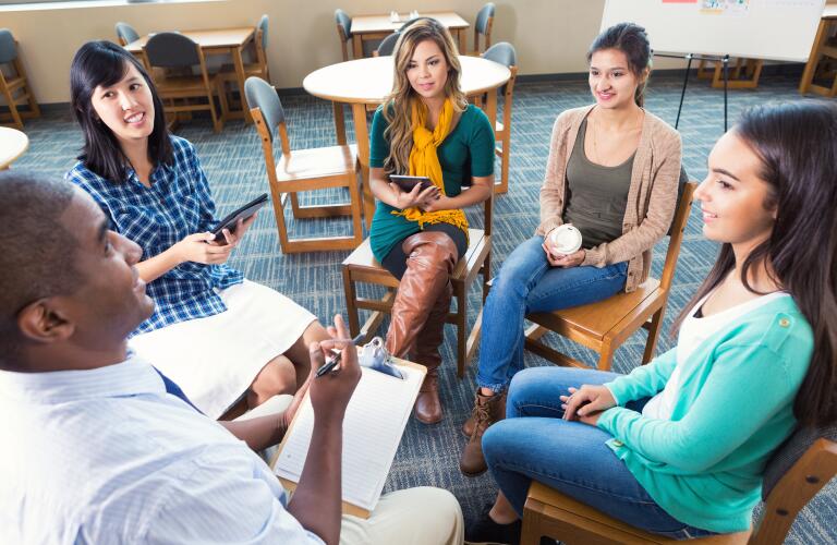 people sitting in circle during support group