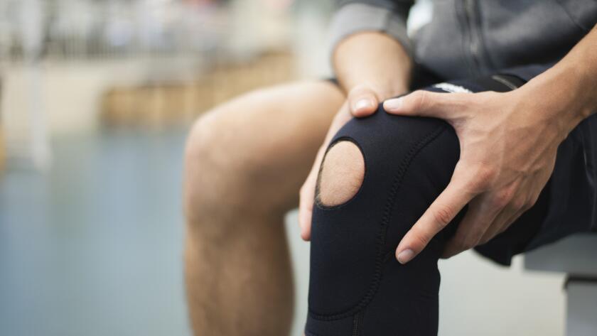 Man wearing knee brace