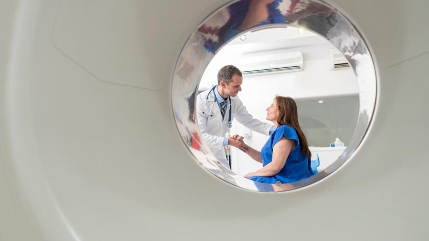 doctor talking to patient before ct scan