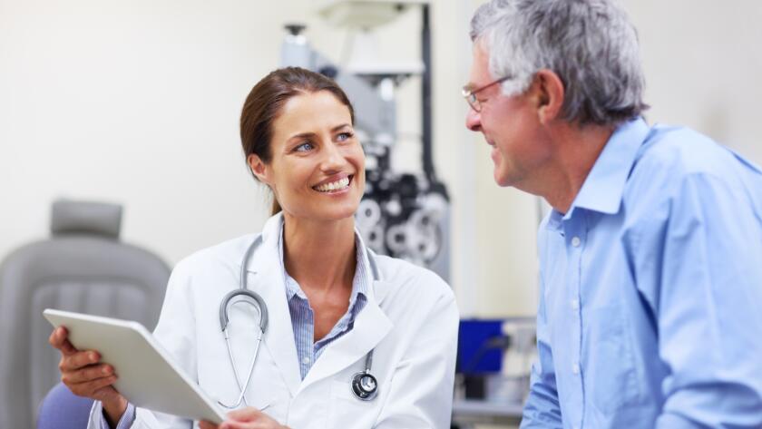 Doctor showing patient information