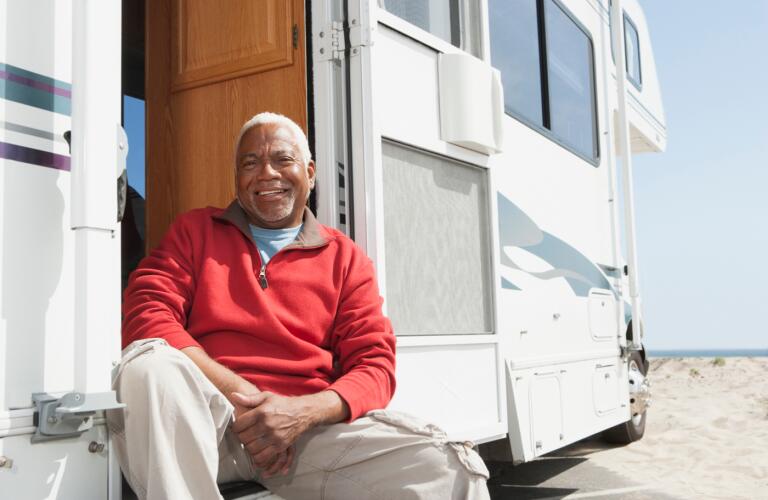 senior-man-smiling-in-RV