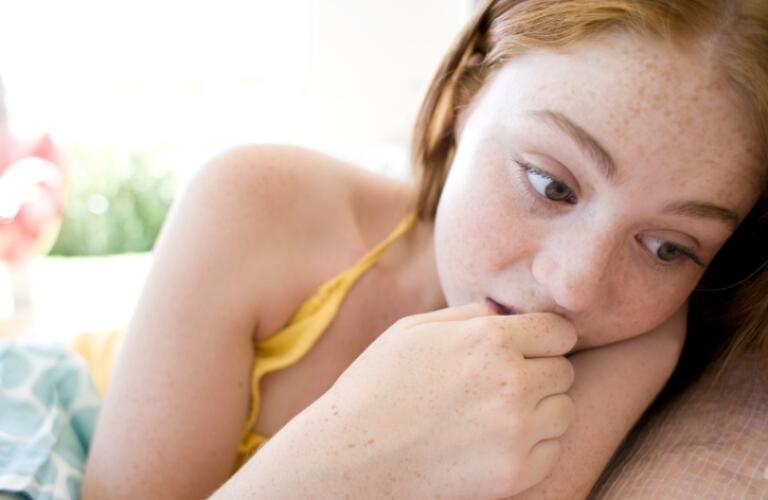 Young Girl Nail Biting