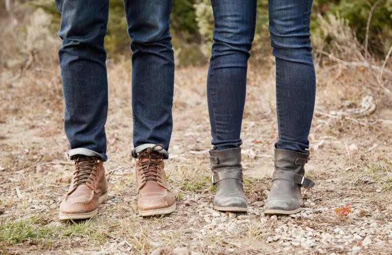 view-of-man-and-womans-legs-standing-outside