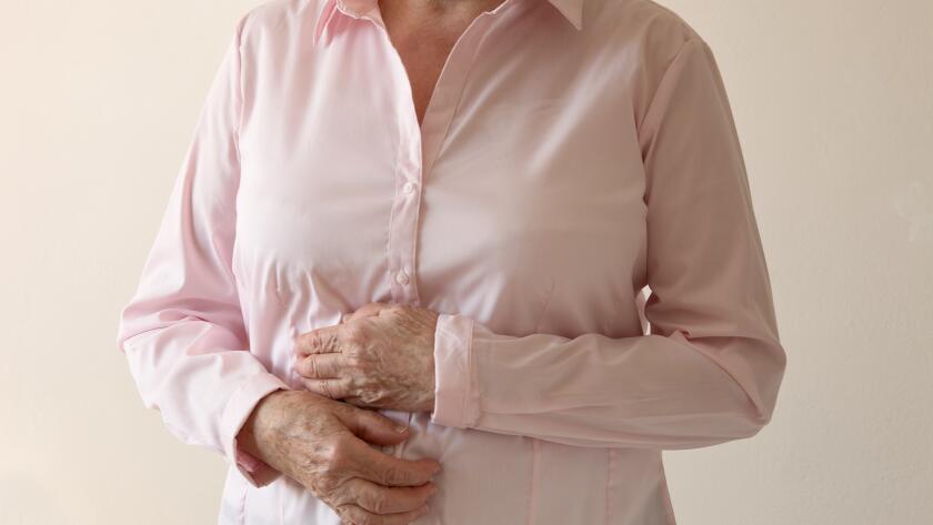 Older woman with stomach pain