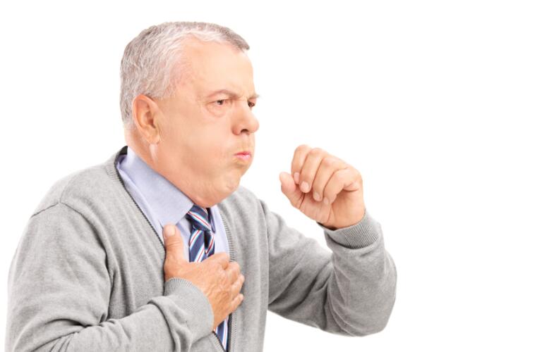 Mature gentleman coughing because of pulmonary disease