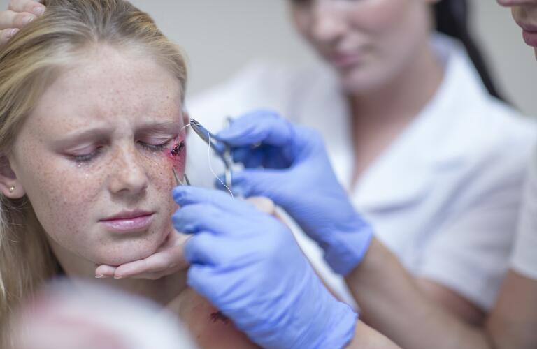 Young girl treated for facial cut