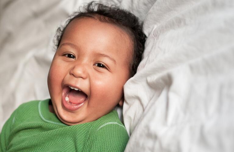 Laughing Baby Boy with New Teeth
