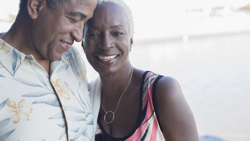 smiling couple embracing