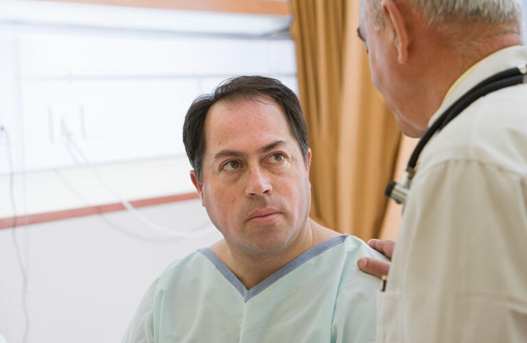 male patient receiving news from doctor