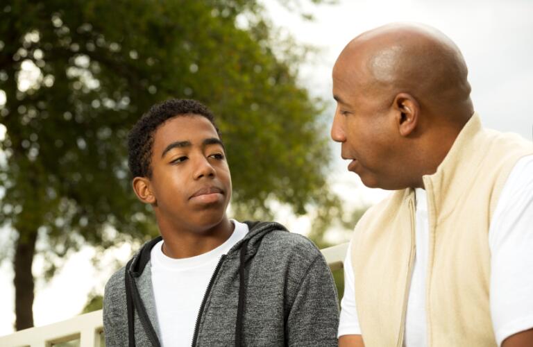 Father and son talking