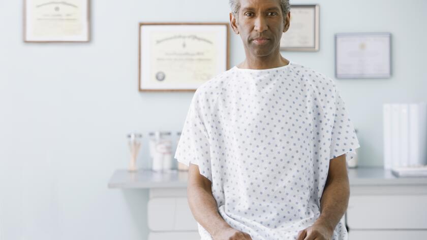 Man in hospital gown
