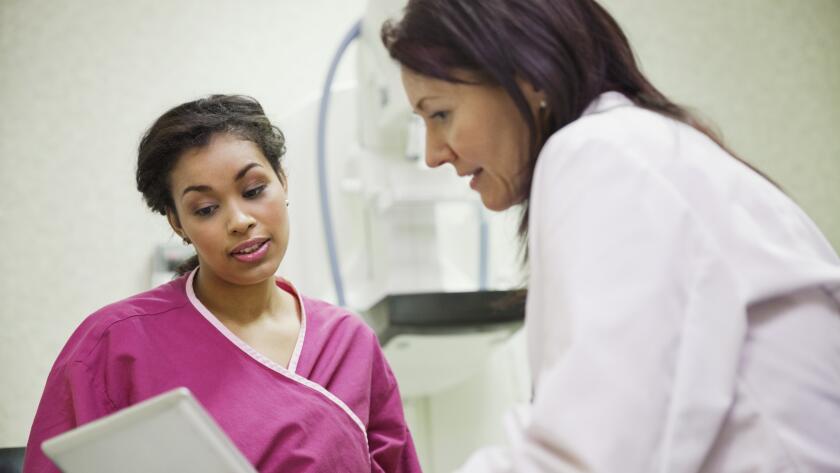 Woman patient with doctor
