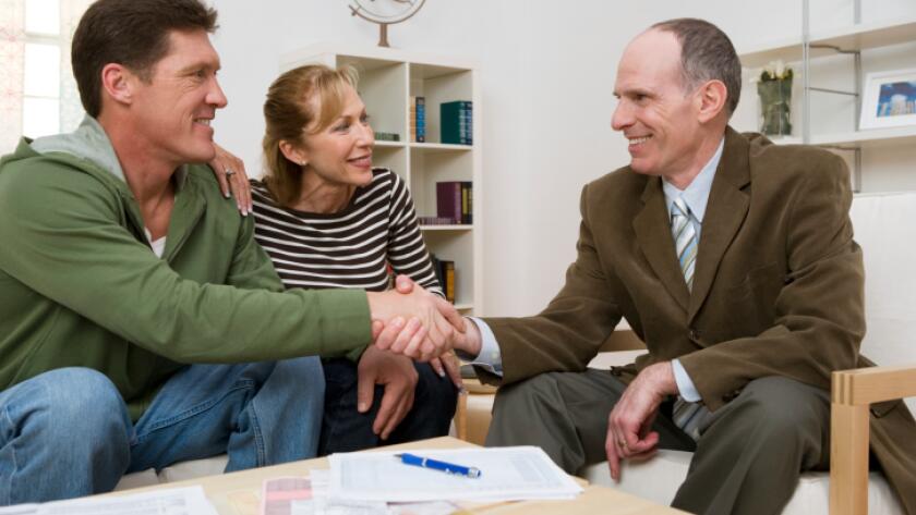 Couple meeting with financial planner