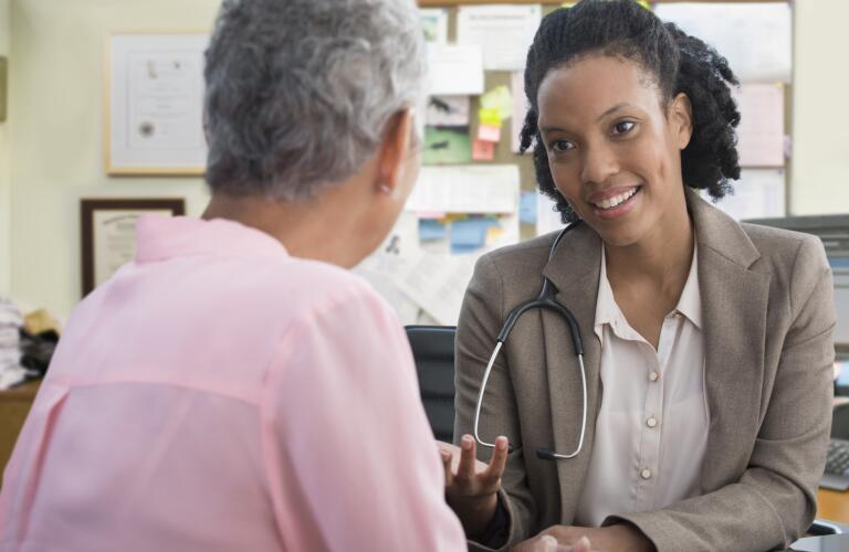 Doctor and patient speaking