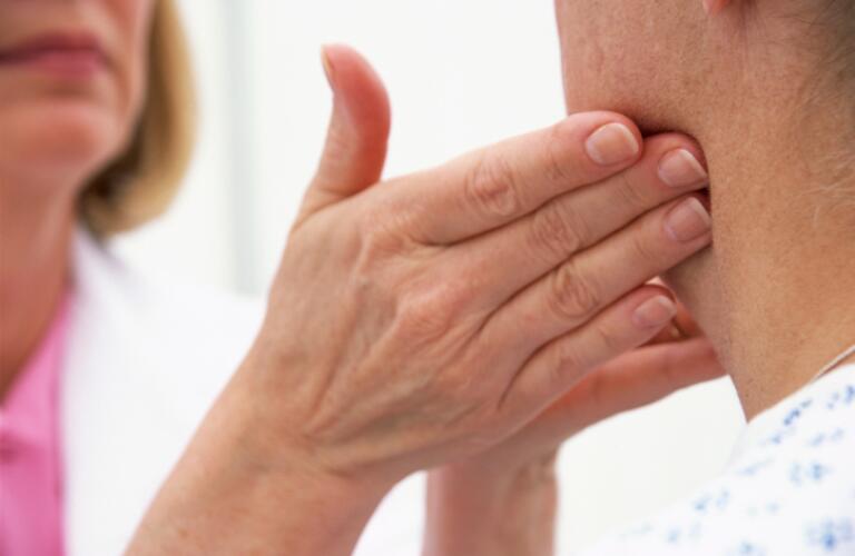 Doctor Examining Patient Lymph Nodes