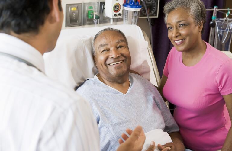 Mature couple with doctor