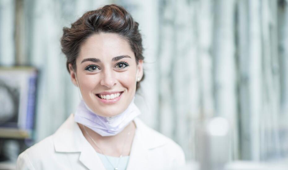 portrait of smiling female dentist