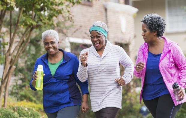 Three senior black women exercising together Three senior black women exercising together