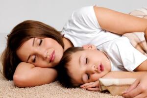 Sleeping mother with child
