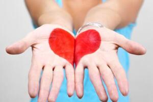 woman with hand painted on heart