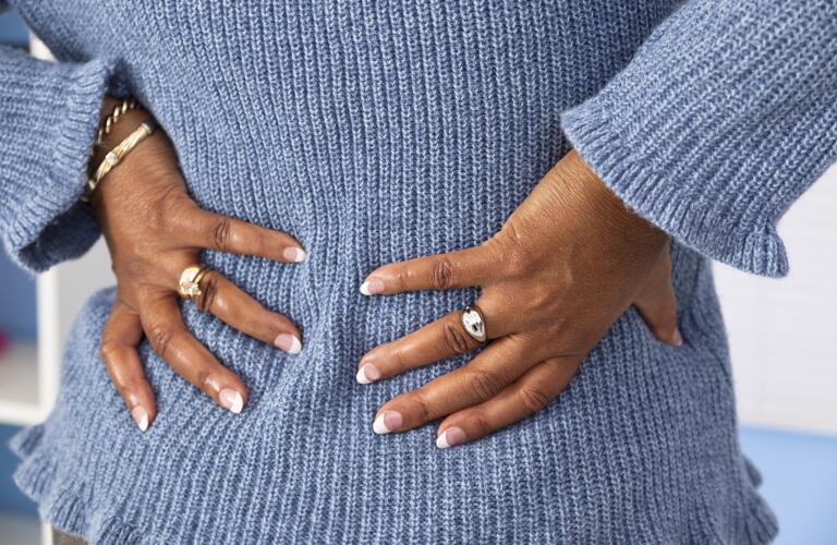 woman-holding-lower-back