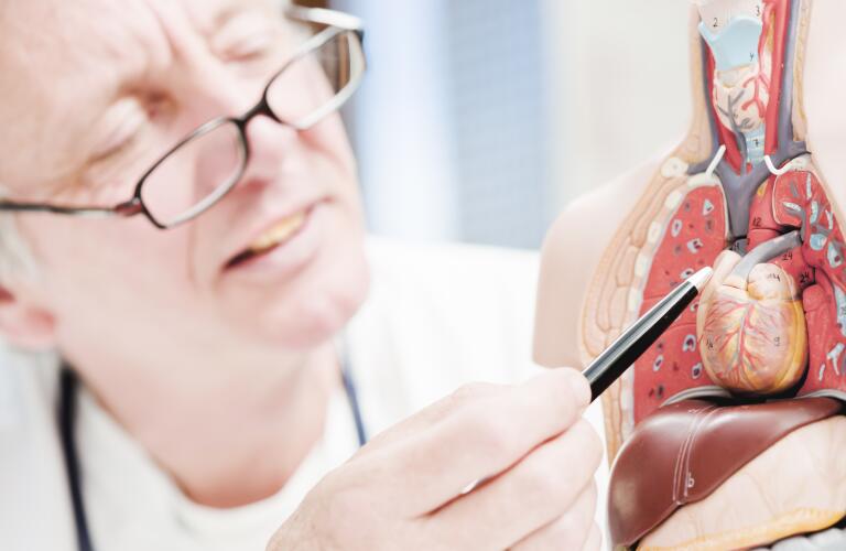 Medicine pointing at heart