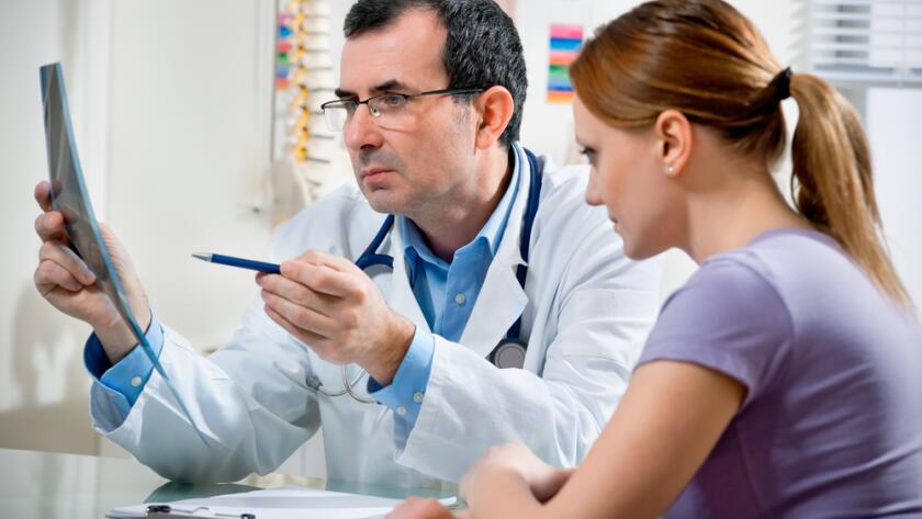 Doctor Discussing Patient Care
