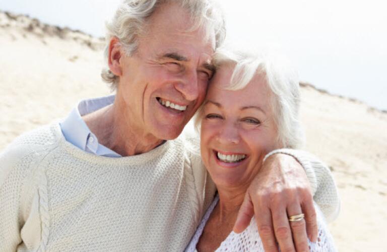 Happy couple on the beach